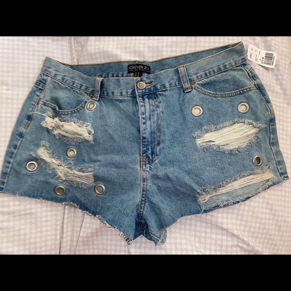 Denim ripped shorts.